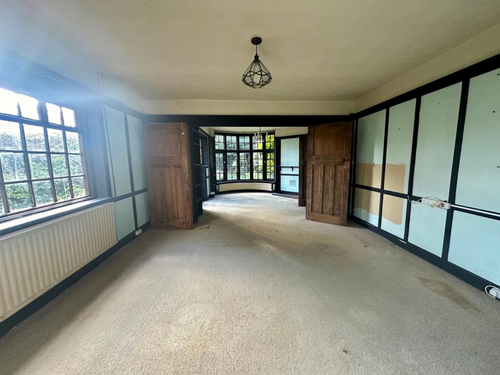 Lot: 129 - FOUR-BEDROOM DETACHED HOUSE FOR REFURBISHMENT - Living and dining room